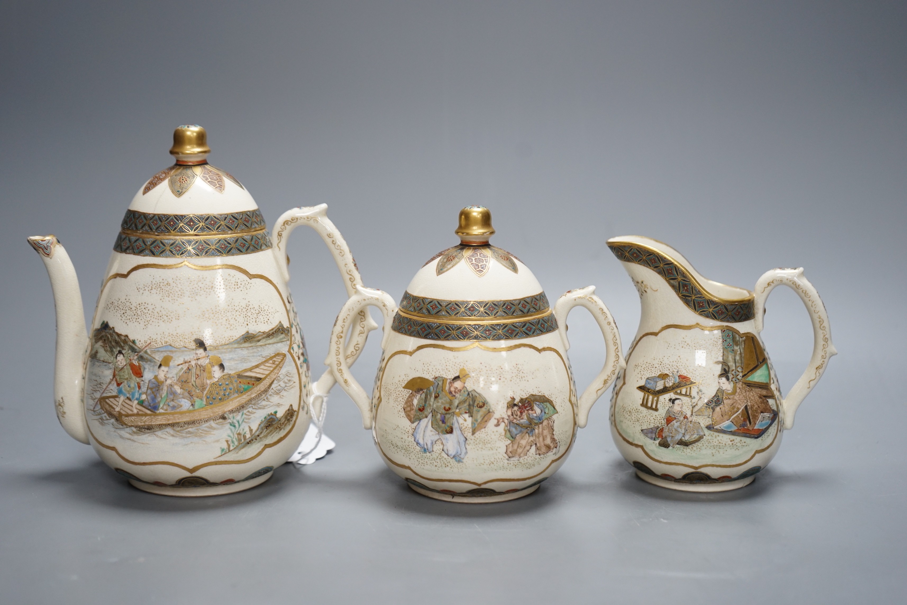 A three piece Japanese Satsuma pottery part tea set, Meiji period